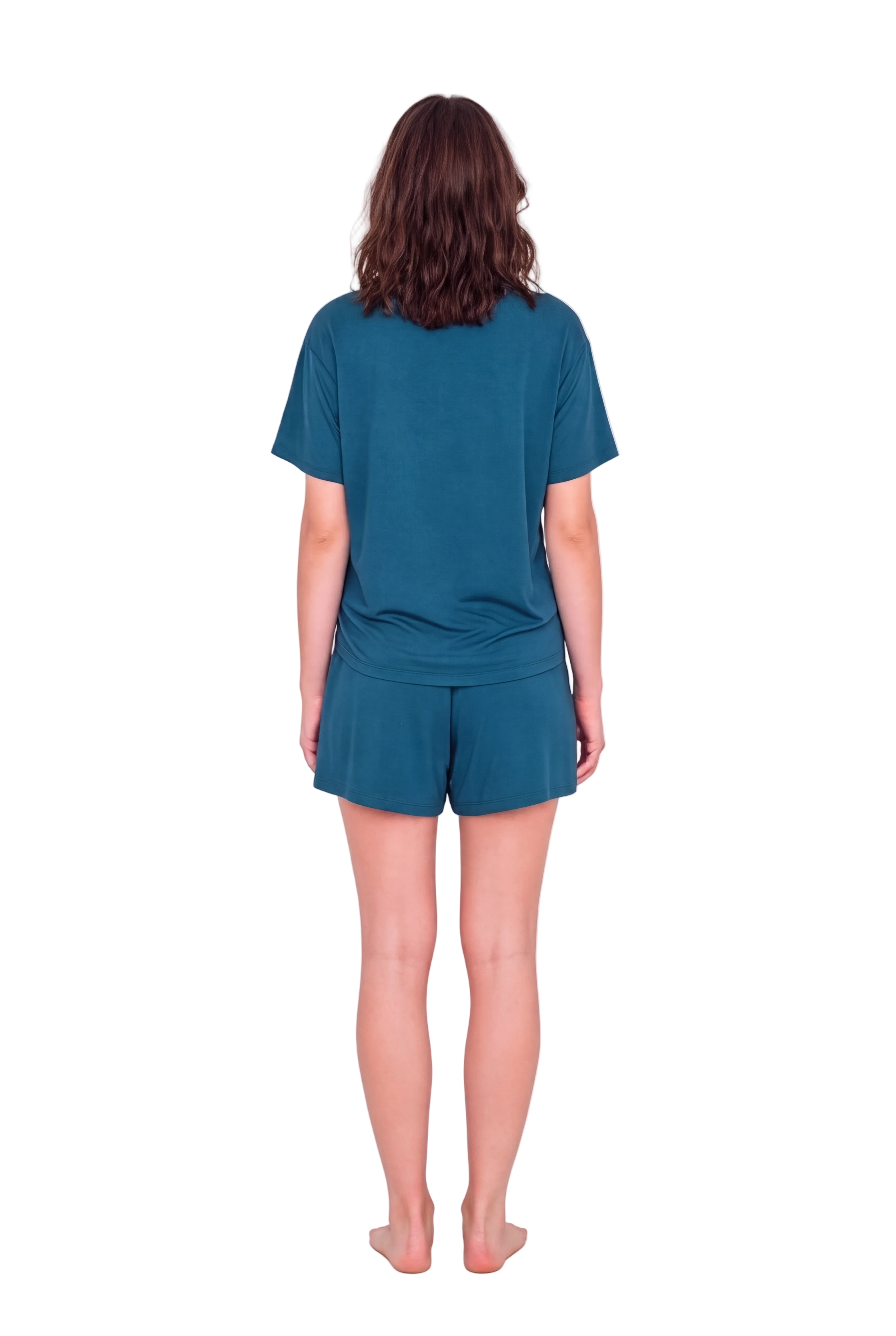 A woman viewed from behind wearing a matching teal short-sleeve t-shirt and shorts set against a plain light background.